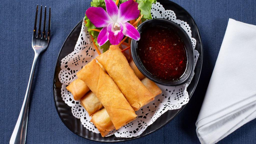 Egg Rolls · Fried vegetarian rolls of cabbage, celery, carrot, glass noodle served with sweet & sour sauce.