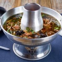 Thai Beef Noodle Soup · Rice noodles in a beef broth with bean sprouts, celery, green onion, fried garlic, meat ball...