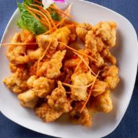 Orange Chicken · Crispy diced chicken with Thai sweet orange sauce.