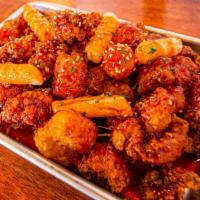 Korean Sweet Popcorn Chicken · POP Chicken, Rice Cake,
Tater Tots