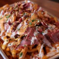 Bacon & Pastrami Fries · SHOESTRING FRIES,  5 PIECE CHICKEN ,
D.C SAUCE, RANCH SAUCE, BACON & PASTRAMI 
CHEDDAR CHEES...