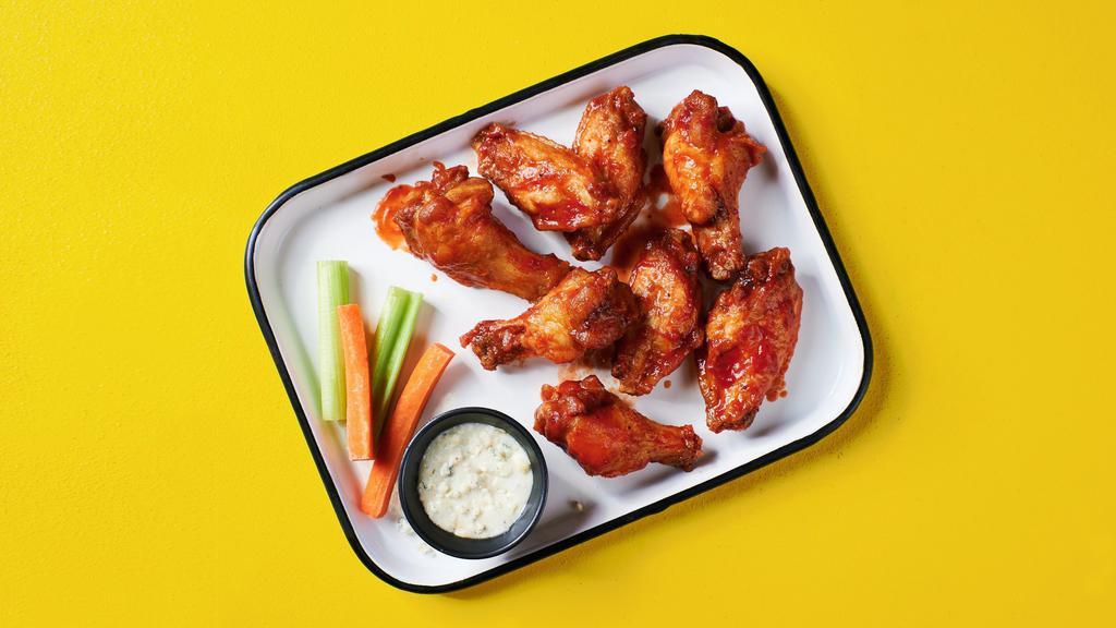 Bigger Blazier Buffalo Wings · Big, spicy, juicy, meaty, tender and saucy buffalo wings, served with your choice of ranch or blue cheese, and crunchy celery and carrots for dipping