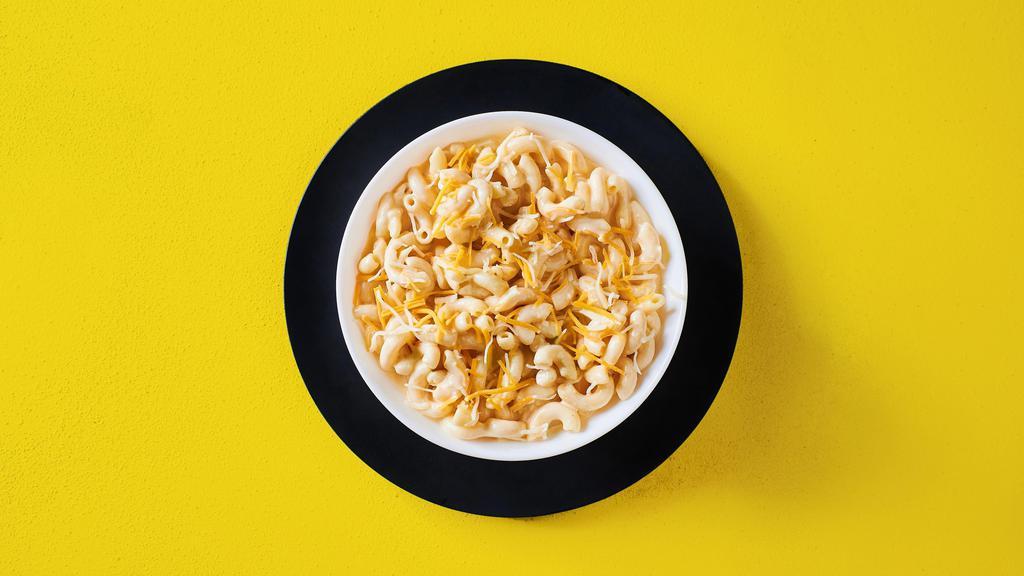 Mac & Yellow · Entrée portion of our creamy, cheesy, oozy mac and cheese topped with shredded cheese