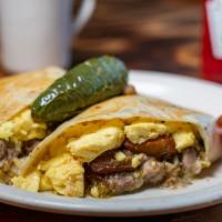 Chili Verde Burrito · Chile Verde wrapped in a flour tortilla with jack cheese, scrambled eggs and choice of potato.