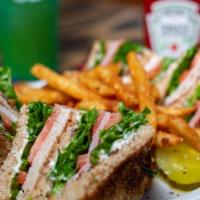 Triple Meat Club Sandwich · Turkey, ham, bacon, lettuce, tomato served on wheat bread.