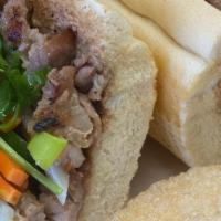 Vietnamese Sandwiches (Banh Mi) · French baguette served w/ choice of meat, cucumber, pickled daikon and carrots, chicken pate...