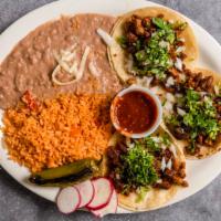 Three Taco Plate · Soft tacos: al pastor, carnitas, fried carnitas or chicharrón, chicken, buche, cabeza, asada...