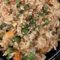 Sticks Fried Rice · Garlic fried rice, onions, peas, carrots, fried egg, scallions and sesame