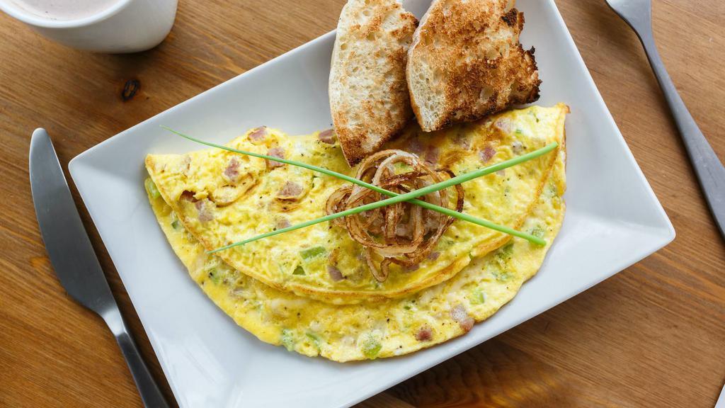 Denver Omelette · Denver style omelette served with hash browns, toast and jelly