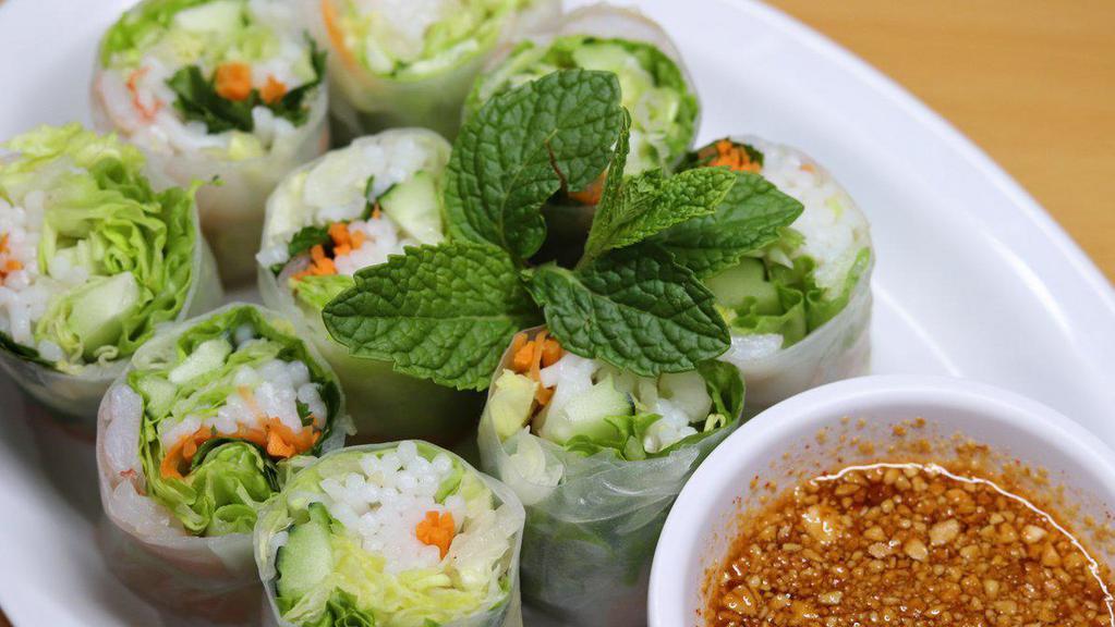 Fresh Roll · Shrimp, mixed greens, and noodles wrapped in clear rice paper. Served with house sweet & sour sauce.