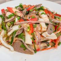 Seafood Salad · Assorted food salad with onions, herbs & traditional spices.