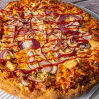 Bbq Chicken Pizza · Chicken with homemade BBQ sauce and mozzarella cheese and red onions.