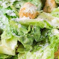Caesar Salad · Romaine lettuce with savory croutons, fresh Parmesan cheese, and Caesar dressing.