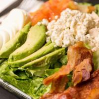 Cobb Salad · Chicken breast, bacon, avocado, boiled eggs, tomato topped with blue cheese crumble.