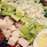 Turkey Cobb Salad · Spring mix, avocado, tomato, bacon, hard-boiled egg, Bleu cheese and house dressing.