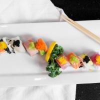 Rainbow Caviar Roll · In: crab, avocado, cucumber / out: assorted fresh fish and flying fish caviar with soy musta...