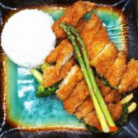 Chicken Katsu Dinner · Deep fried chicken served with rice and salad.