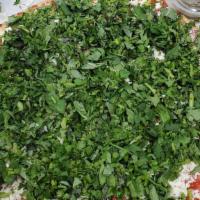 Armenian Pizza · Feta cheese, mozzarella, fresh cilantro, fresh basil, chopped tomatoes, thin crust.