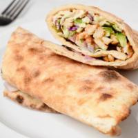 Chicken Shawarma Wrap · Tender strips of chicken, red onion, tomatoes, cilantro, persian cucumber, lettuce, pickle, ...