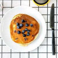 Labc Blueberry Pancakes · Two pancakes with blueberries served with a side of butter and maple syrup. Stack.it.up.