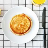 Labc Pancakes · Two pancakes served with a side of butter and maple syrup. Morning sunshine.