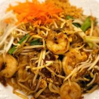 Pad Thai · Rice noodle with egg, scallions, tofu, bean sprout, carrot and crushed peanut.