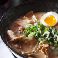 Shoyu  Ramen  · with soup base and shoyu sauce,½ seasoned egg,bamboo shoots, wakame,green onions ,cilantro, ...