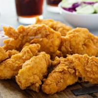 Crispy Chicken Strips Combo · Crispy golden chicken strips with a side of hand cut fries and a drink.