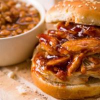 The Bbq Chicken Sandwich · Grilled chicken breast, savory bbq sauce, grilled onions, melted swiss cheese, lettuce, toma...