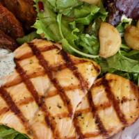 Grilled Salmon Salad · Oven roasted tomatoes, red onion, organic arugula, dill spread served with organic field gre...