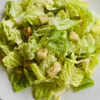 Caesar Salad · Romaine lettuce, croutons, parmesan cheese, pasteurized egg with an anchovy dressing.