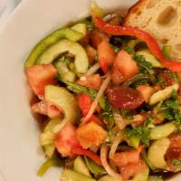 Panzanella Salad · Tuscan tomato salad with cucumbers, bell peppers, onion, toasted peasant bread and balsamic ...