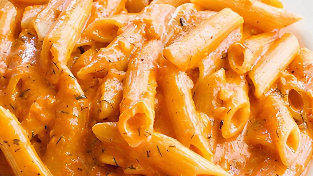 Penne Alla Vodka · Shallots and dill flambeed with vodka in a creamy tomato sauce.