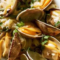 Linguini & Clams · Manilla clams sauteed with white wine and garlic or red sauce.