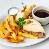 Roast Beef Dip Sandwich · Thinly-sliced roast beef and caramelized onions, on a French roll, served with au jus.