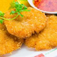 Fried Shrimp Cakes · Deep fried ground shrimp mixed, served with sweet and sour sauce