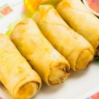 Egg Rolls · Mixed vegetables, ground chicken and bean thread wrapped in egg roll skin, deep fried. Serve...