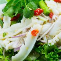 Squid Salad · Squid, onions and spicy hot lime dressing.