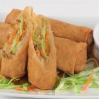 Veggie Egg Rolls · Stuffed with shredded cabbage, carrots, glass noodles, and black mushrooms. Served with swee...