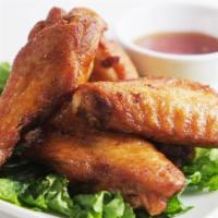 Chicken Wings · Five  fried chicken wings with sweet and sour sauce.