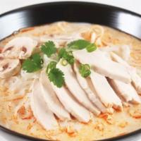 Chicken Tom Kah · Mushrooms, cilantro, green onions, lemongrass, coconut soup, and rice stick noodles. Gluten ...