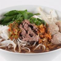 #30. Thai Boat Noodles · Rare beef slices, beef balls, tendon, tripe, green onions, cilantro and rice stick noodles i...