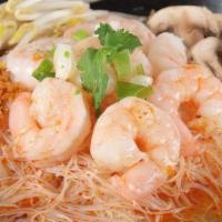 #27. Shrimp Tom Yum · Shrimp, mushrooms, green onions, cilantro and rice vermicelli noodles in spicy tom yum soup ...