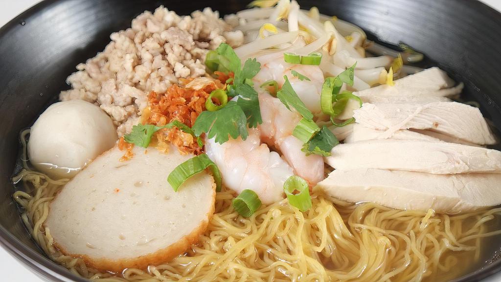 #34. House Noodles · Shrimp, chicken, ground pork, fish ball, fish cakes with bean sprouts, green onions and cilantro.