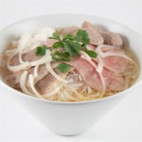 #47. Combo Pho · Rare slices of steak, well done flank, beef balls, tendon, tripe, onions, green onions, cila...