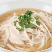 Chicken Pho Soup · Chicken slices with onions, green onions, cilantro, and rice stick noodles.