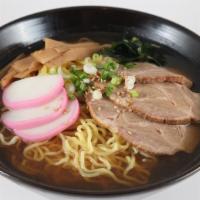 #59. Shoyu Ramen · Japanese fish cake, pork slices, bamboo shoots and seaweed in soy sauce based broth with ram...