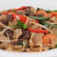 Drunken Noodles · Choice of protein, rice noodles, beansprouts, white onions, bell peppers, jalapeños, carrots...