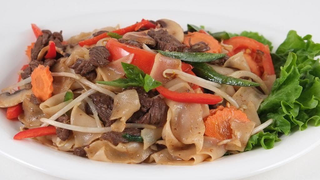 Drunken Noodles · Choice of protein, rice noodles, bean sprouts, bell pepper, jalapeno, carrot, mushroom, tomato, onion, and basil.