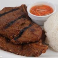 #103. Char-Broiled Pork Chop · Pork chop marinated in special sauce, grilled and served with steamed rice.